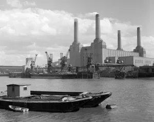 A ship unloading at the pier at Battersea Power Station, seen from across the Thames A ship unloading at the pier at Battersea Power Station, seen from across the Thames