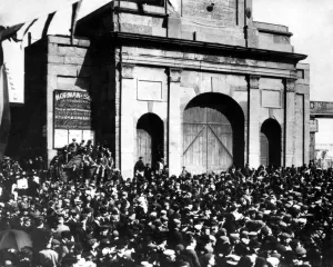 Spectators outside the East India Dock gates watching the opening of the Blackwall Spectators outside the East India Dock gates watching the opening of the Blackwall