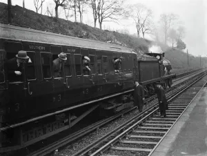 Testing electrified railway lines by steam train in Swanley , Kent . 1938 Testing electrified railway lines by steam train in Swanley , Kent . 1938