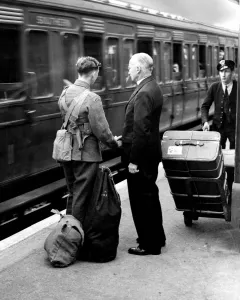 Vicar says goodbye to his son Sidcup Station Kent 1939 photograph by John Topham Vicar says goodbye to his son Sidcup Station Kent 1939 photograph by John Topham