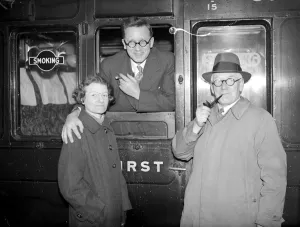 At Waterloo. Mr Herbert Morrison on his departure for USA Mrs Morrison and Mr Harold Clay At Waterloo. Mr Herbert Morrison on his departure for USA Mrs Morrison and Mr Harold Clay