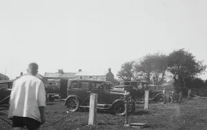 Cars parked in a field for a Cornish wrestling match at an unknown location, Cornwall Cars parked in a field for a Cornish wrestling match at an unknown location, Cornwall