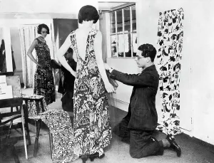 George Criscuolo fitting an evening gown of Crysede silk, St Ives, Cornwall. Around 1927 George Criscuolo fitting an evening gown of Crysede silk, St Ives, Cornwall. Around 1927