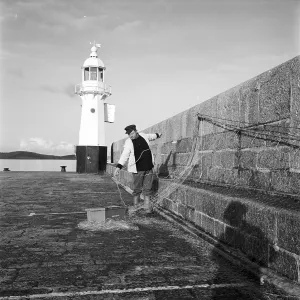 The harbour light, Victoria Pier, Mevagissey, Cornwall. 1982 The harbour light, Victoria Pier, Mevagissey, Cornwall. 1982
