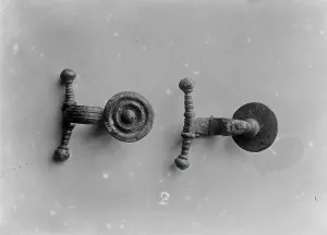 Two Iron Age brooches from the Iron Age cemetery at Harlyn Bay, St Merryn, Cornwall Two Iron Age brooches from the Iron Age cemetery at Harlyn Bay, St Merryn, Cornwall