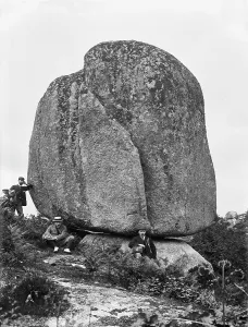 Places/luxulyan/men near huge granite boulder luxulyan valley Places/luxulyan/men near huge granite boulder luxulyan valley