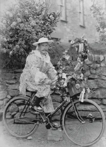Samuel John Govier posed in fancy dress on his bicycle, locality unknown but somewhere in Samuel John Govier posed in fancy dress on his bicycle, locality unknown but somewhere in