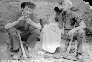 Two young miners at croust time at an unidentified mine in Cornwall. Late 1800s Two young miners at croust time at an unidentified mine in Cornwall. Late 1800s