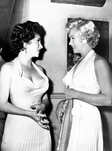Prints of American actress Marilyn Monroe and Italian actress Gina Lollobrigida argue among themselves on September 18, 1954 during a gala given in a New York theater Actors And Actress Prints: Marilyn Monroe and Gina Lollobrigida Print
