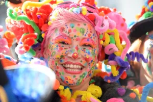 A costumed woman celebrates the street carnival in Duesseldorf, western Germany on February 27 A costumed woman celebrates the street carnival in Duesseldorf, western Germany on February 27