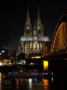 The Hohenzollern bridge is seen in front of the Cologne cathedral on December 31 The Hohenzollern bridge is seen in front of the Cologne cathedral on December 31