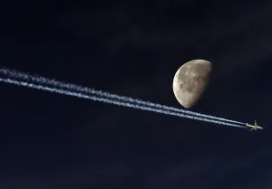 Jetliner Vapour Trail Passing the Moon Jetliner Vapour Trail Passing the Moon