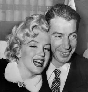 Marilyn Monroe with Joe DiMaggio during their wedding ceremony Marilyn Monroe with Joe DiMaggio during their wedding ceremony