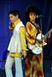 Prints of US singer and musician Prince (born Prince Rogers Nelson) and singer and guitarist Andy Allo perform on stage at the Stade de France in Saint-Denis, outside Paris, on June 30, 2011 Music Prints: Print of Prince performing live at Stade de France