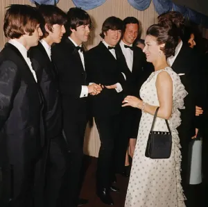 Prints of Members of the British pop group, The Beatles (L-R), Ringo Starr, George Harrison, Paul McCartney and John Lennon meet 29 July 1965 in London with Britains Princess Margaret England Prints: Print of The Beatles and Princess Margaret at the Help film premiere