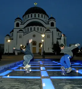Prints of Teenagers skateboard in front of the Saint-Sava church in Belgrade 19 December 2004. AFP PHOTO / KOCA SULEJMANOVIC / AFP PHOTO / KOCA SULEJMANOVIC Montenegro Prints: Serbia and Montenegro Print: Teenagers Skateboard in Belgrade