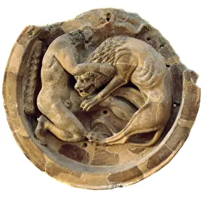 Acroterial disc with the depiction of Heracles and the lion of Nemea, from Fratte di Salerno, Scigliato district Acroterial disc with the depiction of Heracles and the lion of Nemea, from Fratte di Salerno, Scigliato district