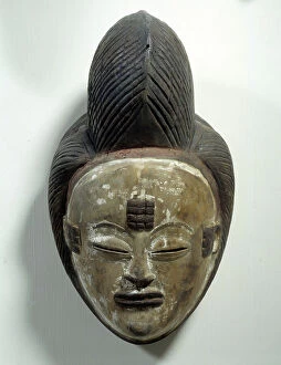 Related Images Collection: African Art: Mukuyi mask from Gabon made of wood and kaolin powder. Dim. 28 cm Paris, Musee Picasso