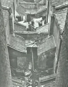 Prints of GHL1787992 Slum housing, 1943 (b/w photo) by English Photographer, (20th century); London Metropolitan Archives, City of London; (add.info.: Slum housing) Slums Prints: Black and White Print of London Slum Housing