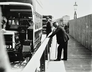 Historic Bridges UK Prints: Waterloo Bridge: motorised vehicles and a pedestrian on the bridge, 1924 (b/w photo)