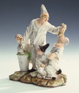 A Buen Retiro Italian comedy group of spaghetti-eaters, c.1760 A Buen Retiro Italian comedy group of spaghetti-eaters, c.1760