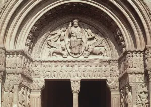 Detail of the church exterior showing the tympanum depicting Christ in Majesty with Detail of the church exterior showing the tympanum depicting Christ in Majesty with