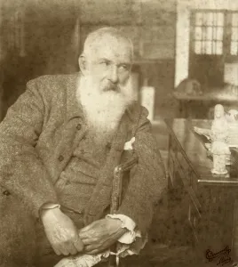 Claude Monet (1841-1926) with a Tanagra statuette, early 20th century Claude Monet (1841-1926) with a Tanagra statuette, early 20th century