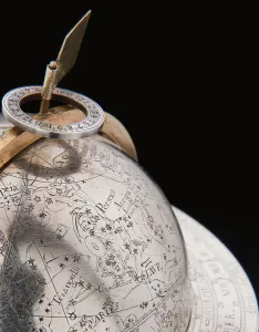 Two exceptional terrestrial and celestial globes, supported by Hercules and Atlas Two exceptional terrestrial and celestial globes, supported by Hercules and Atlas