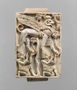 Furniture plaque carved in relief with a ram-headed sphinx, c.9th-8th century B.C Furniture plaque carved in relief with a ram-headed sphinx, c.9th-8th century B.C