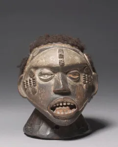 Headdress, early 1900s (wood, hair & pigment) Headdress, early 1900s (wood, hair & pigment)