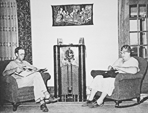 Listening to one of President Roosevelt's Fireside Chats on the radio Listening to one of President Roosevelt's Fireside Chats on the radio