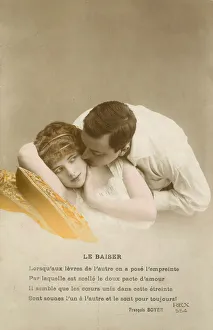 Man kissing shy girl on the cheek (colour photo) Man kissing shy girl on the cheek (colour photo)