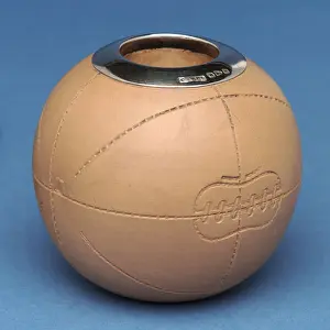 Match holder in the shape of a football, Doulton & Co., Lambeth (ceramic) Match holder in the shape of a football, Doulton & Co., Lambeth (ceramic)