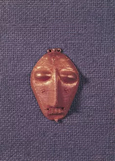 Dakar Collection: Pendant of a human mask, Baule Population, Ivory Coast, 18th-20th century (gold)