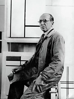 Piet Mondrian Collection: Piet Mondrian in his studio at 26 avenue du Depart, 1934 (b/w photo)