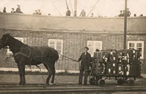 Porter with a horse-drawn luggage trolley at the docks (b/w photo) Porter with a horse-drawn luggage trolley at the docks (b/w photo)