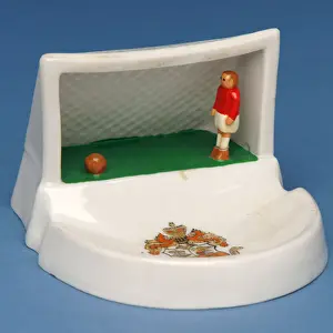 Rare amorial souvenir of Douglas, Isle of Man, showing a goalkeeper in his goal (ceramic) Rare amorial souvenir of Douglas, Isle of Man, showing a goalkeeper in his goal (ceramic)