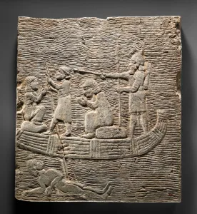Relief: Assyrian soldier conducting captives across the water, c Relief: Assyrian soldier conducting captives across the water, c