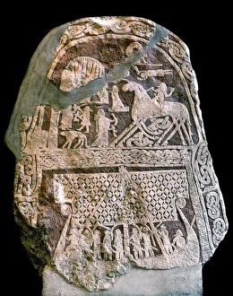 Runestone depicting Wotan (Odin) on his eight-legged horse Sleipnir Runestone depicting Wotan (Odin) on his eight-legged horse Sleipnir
