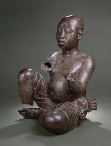 Seated figure, Tada, 13th - 14th century (copper) Seated figure, Tada, 13th - 14th century (copper)