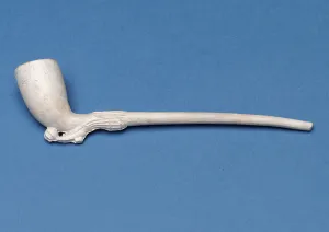 Small pipe with stem in shape of a lady's leg and boot (clay) Small pipe with stem in shape of a lady's leg and boot (clay)