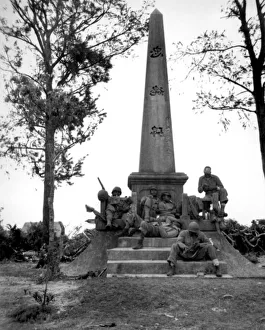 Soldiers at the Base of a Japanese War Memorial, Battle of Okinawa, 12th April 1945 (b/w photo) Soldiers at the Base of a Japanese War Memorial, Battle of Okinawa, 12th April 1945 (b/w photo)