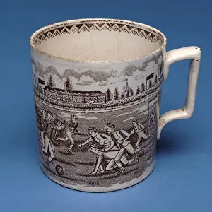 Staffordshire pint mug with sepia transfer of a football match (ceramic) Staffordshire pint mug with sepia transfer of a football match (ceramic)