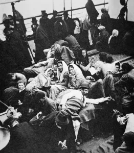 Steerage passengers enjoying fresh air on deck as their ship enters New York harbour, c Steerage passengers enjoying fresh air on deck as their ship enters New York harbour, c