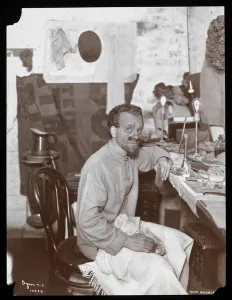 William Norris applying makeup for his character of the King's Jester in ' William Norris applying makeup for his character of the King's Jester in '