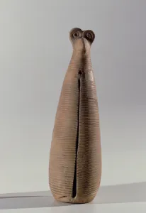 Wind instrument in the form of a robed woman, from Lorestan, Iran Wind instrument in the form of a robed woman, from Lorestan, Iran