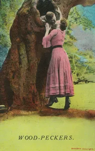Woodpeckers: woman kissing a man inside a hollow tree (coloured photo) Woodpeckers: woman kissing a man inside a hollow tree (coloured photo)
