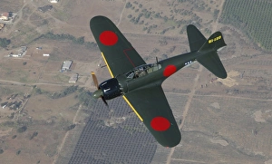A6M Japaneese Zero flying over Chino, California A6M Japaneese Zero flying over Chino, California