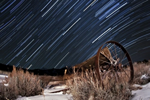 Abandoned farm equipment against a backdrop of star trails Abandoned farm equipment against a backdrop of star trails