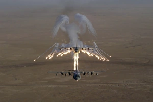 Aerial shot over Iraq of a KC-130 Stratotanker firing flares Aerial shot over Iraq of a KC-130 Stratotanker firing flares
